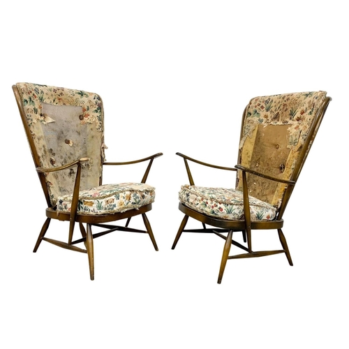 917 - A pair of Ercol model 478 high back armchairs. Mid Century.