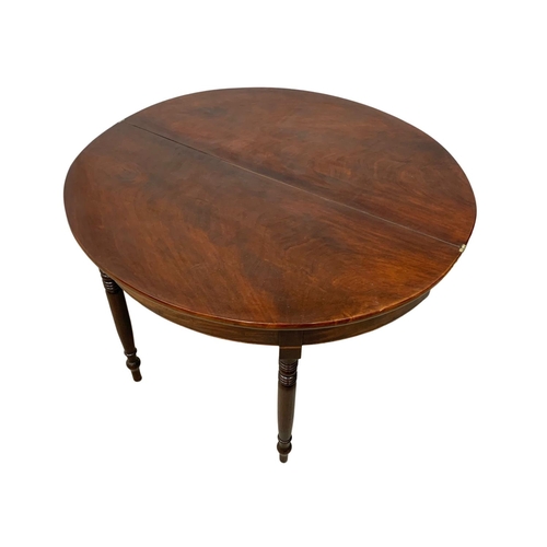 1087 - Late Georgian mahogany turnover tea table. Circa 1825-1835. 139 x 51 x 76cm