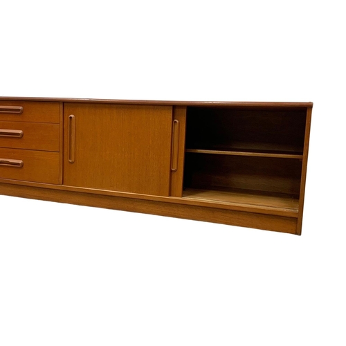 1088 - A teak Mid Century low-board. 183 x 44 x 51.5cm