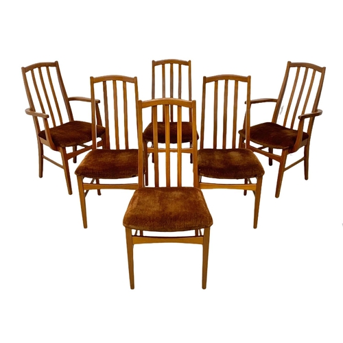 1089 - A teak Mid Century extending dining table and 6 chairs. Open 199 x 91 x 74.5cm. Closed 152.5cm.