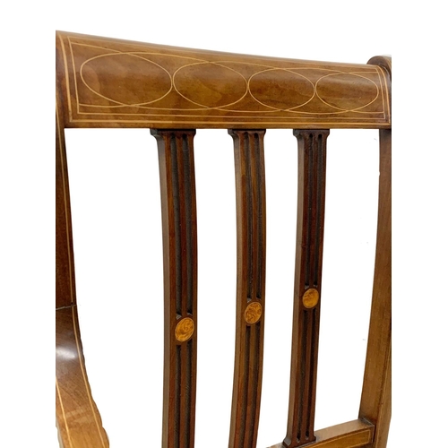 1093 - An Edwardian inlaid mahogany hall chair.