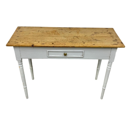 1094 - A Victorian pine side table with dummy drawer. 106 x 42 x 73.5cm