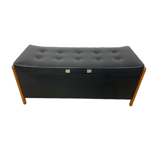 1155 - A Mid Century storage ottoman box in black vinyl. 1960's-1970's 98 x 36 x 42.5cm.