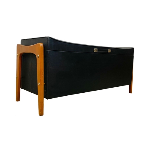 1155 - A Mid Century storage ottoman box in black vinyl. 1960's-1970's 98 x 36 x 42.5cm.