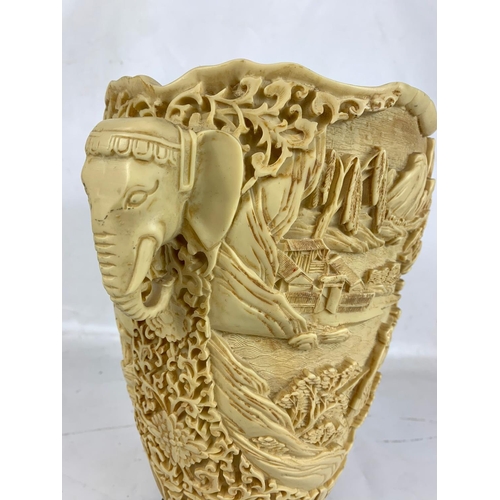 389h - A large vintage faux ivory Far Eastern vase. 26 x 31.5cm.