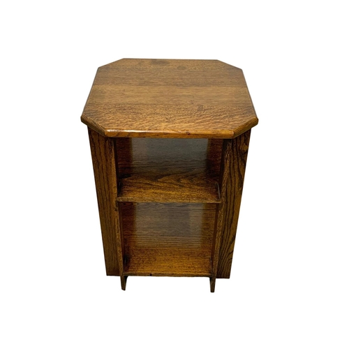 1116 - A 1930’s Art Deco oak 3 tier side table. 45 x 64cm