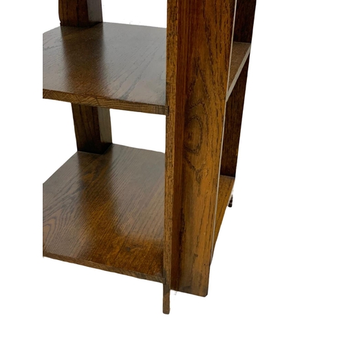 1116 - A 1930’s Art Deco oak 3 tier side table. 45 x 64cm