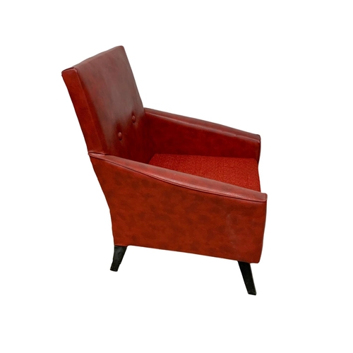 1117 - A 1960’s Mid Century red vinyl armchair