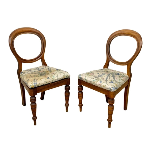 1118 - A pair of Victorian mahogany balloon back chairs. Circa 1880