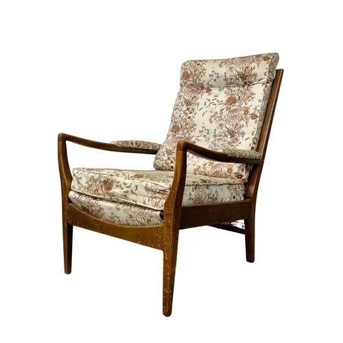 1132 - A pair of vintage Cintique armchairs.