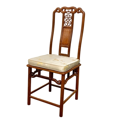 1133 - A Chinese teak role top cylinder desk and matching chair. 88.5 x 54.5 x 117cm.