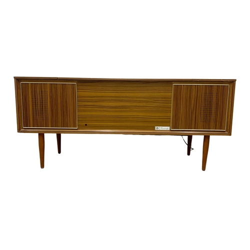 1139 - A Mid Century radiogram. 127.5 x 41 x 56cm