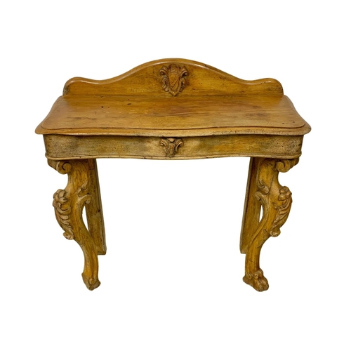 1148 - A Victorian pine console table on cabriole legs. Circa 1870. 96 x 38 x 99cm.