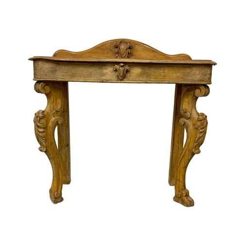 1148 - A Victorian pine console table on cabriole legs. Circa 1870. 96 x 38 x 99cm.