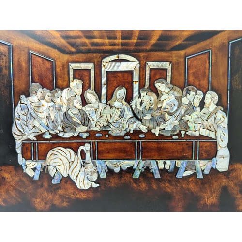 326 - An ornate panel of The Last Supper with Mother of Pearl inlay. 60.5 x 43.5cm