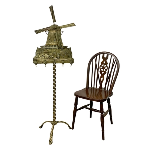 343 - A tall late 19th century brass windmill fire tool stand. 138cm