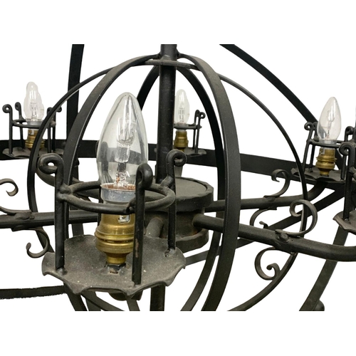 346 - A very large wrought iron chandelier. 80 x 100cm