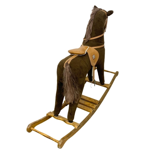 350 - A rocking horse. 144cm