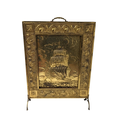 359 - A brass fire surround. 47.5x66cm