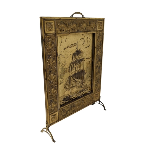 359 - A brass fire surround. 47.5x66cm