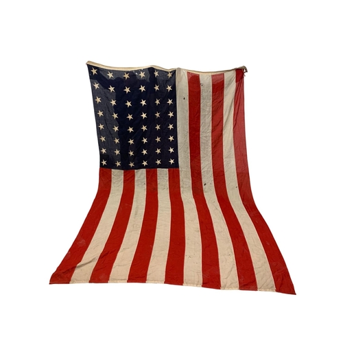 360 - A very large early 20th century USA flag. 48 stars. 243 x 362cm.