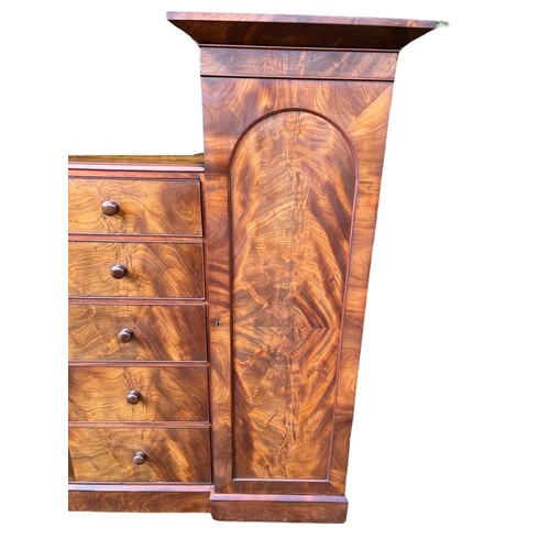 791 - A large Victorian mahogany wardrobe with exterior drawers