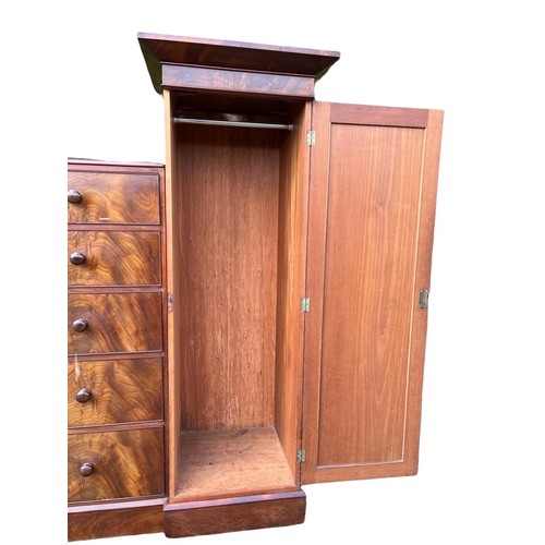 791 - A large Victorian mahogany wardrobe with exterior drawers