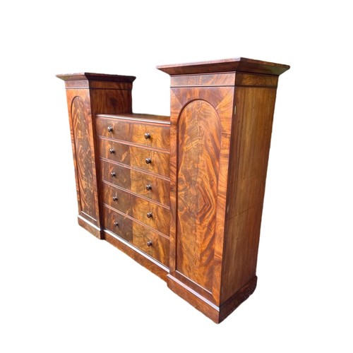 791 - A large Victorian mahogany wardrobe with exterior drawers