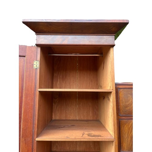 791 - A large Victorian mahogany wardrobe with exterior drawers