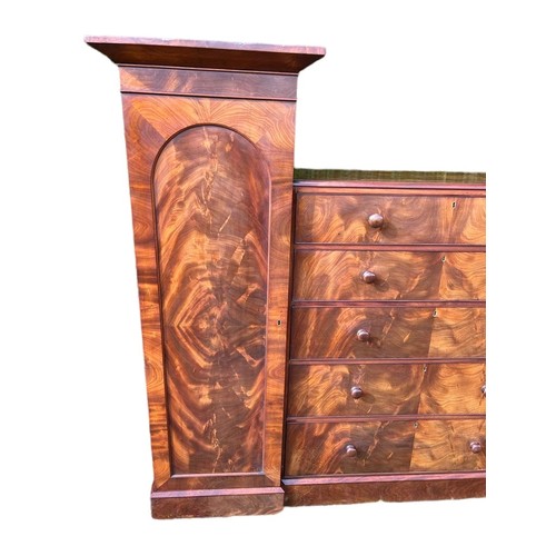 791 - A large Victorian mahogany wardrobe with exterior drawers