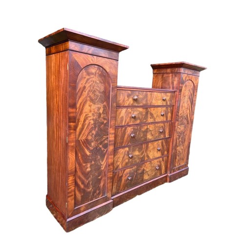 791 - A large Victorian mahogany wardrobe with exterior drawers