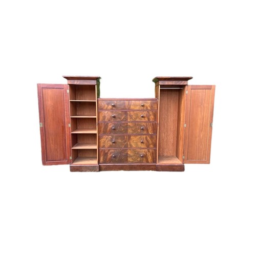 791 - A large Victorian mahogany wardrobe with exterior drawers