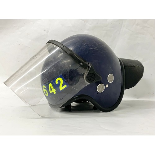 389L - A police riot helmet.