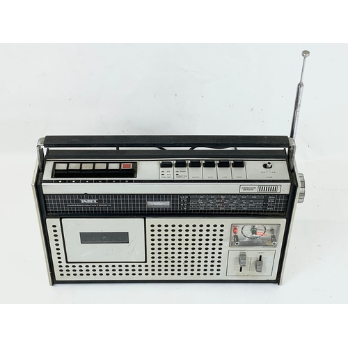 9 - A vintage Intel radio cassette player.