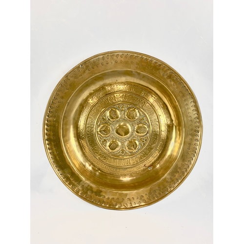 21 - A late 19th century brass wall plaque. 45.5cm