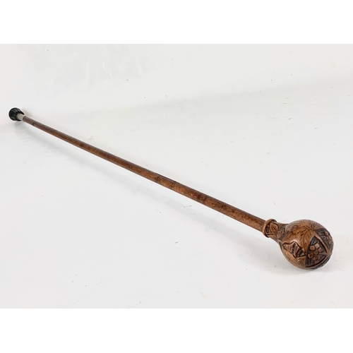 27 - An early 20th century fruitwood walking cane. 80cm