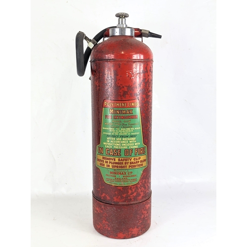 32 - A vintage fire extinguisher. 63.5cm