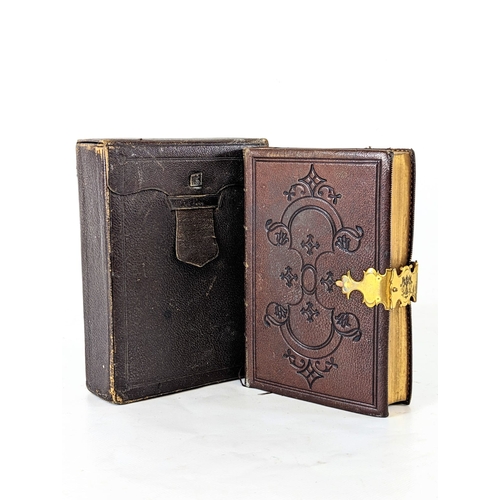 49 - A 19th century leather Bible in case, dated 1870. Bible measures 16.5cm
