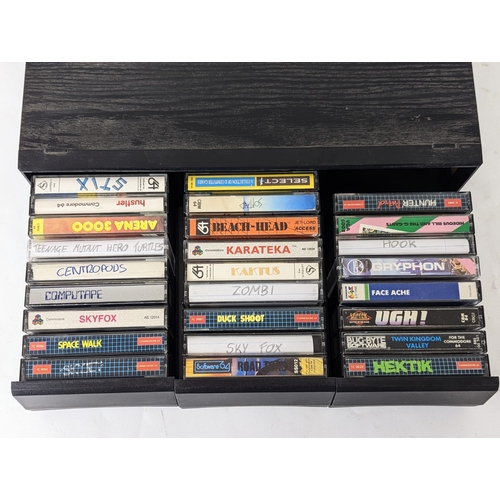 51 - A vintage collection of Commodore 64 games.