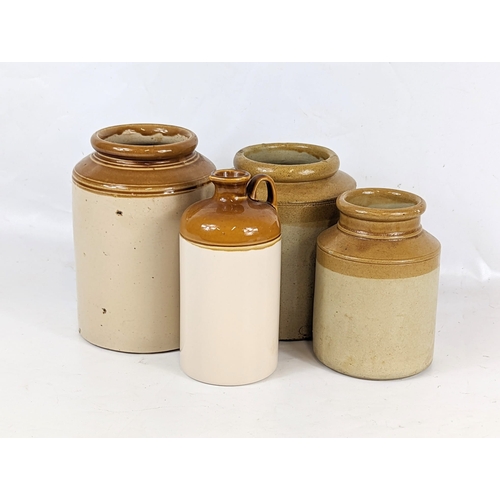 65 - A collection of vintage stoneware jars. Largest measures 15x21.5cm