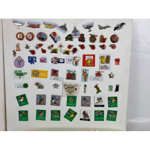 69 - A collection of badges.