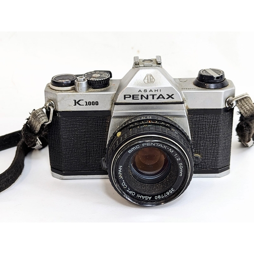 72 - A vintage Asahi Pentax K1000 camera.
