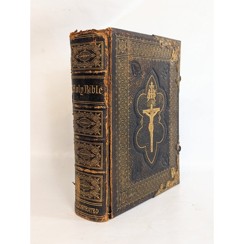 76 - A late 19th century leather and brass Bible.