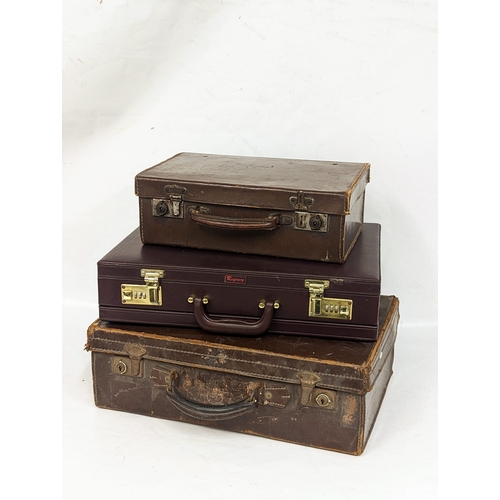 83 - 3 vintage leather cases. 44x10x32cm