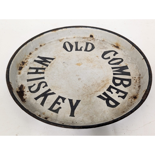 84 - A vintage Old Comber Whiskey enamel pub tray. 30.5x3cm