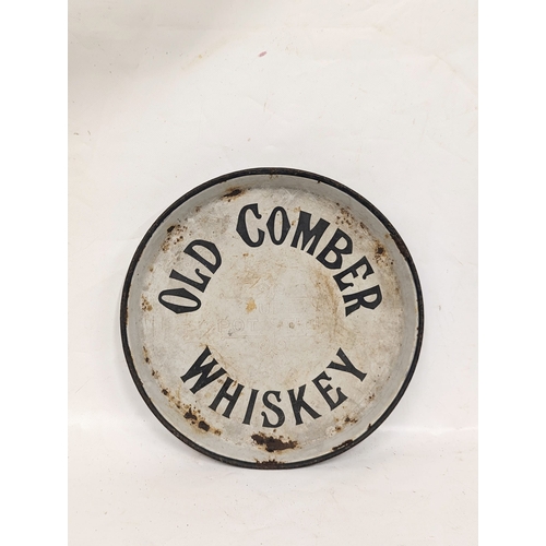 84 - A vintage Old Comber Whiskey enamel pub tray. 30.5x3cm