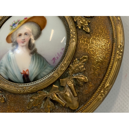 93 - A 19th century French hand painted signed miniature, in brass frame. Ribot. 10.5cm