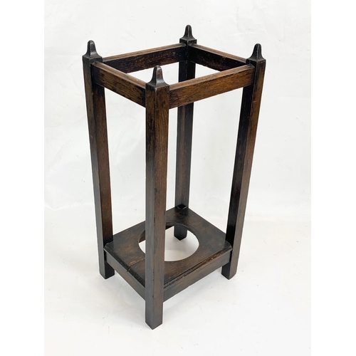 108 - A 1920’s oak stick stand 61cm