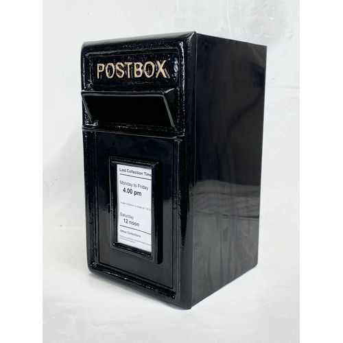 109 - A cast iron Post Box. 24 x 28 x 44cm