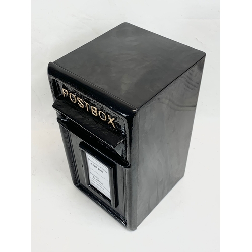 109 - A cast iron Post Box. 24 x 28 x 44cm